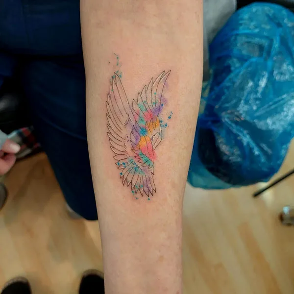 Watercolor angel wings tattoo