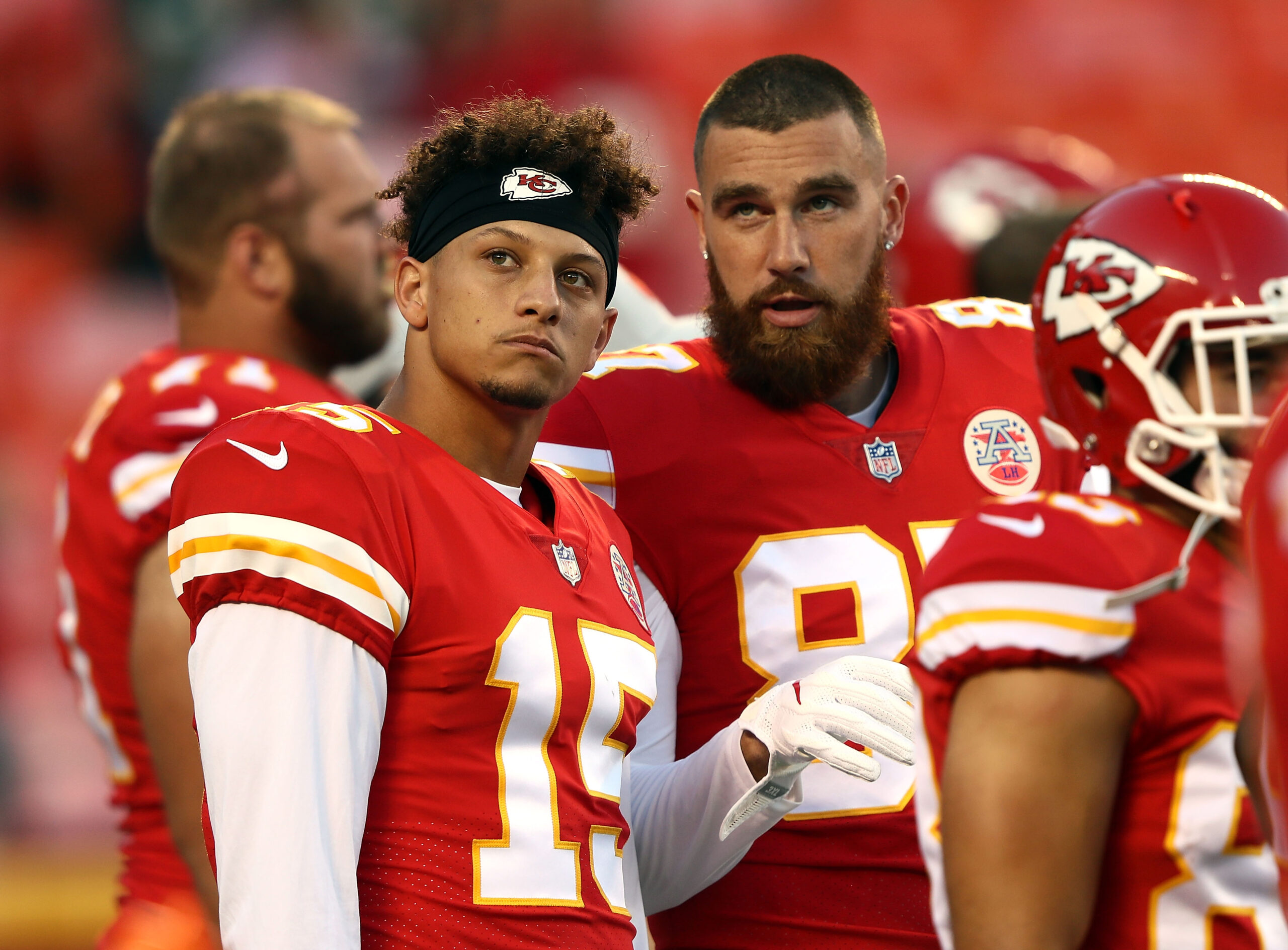 Patrick Mahomes and Travis Kelce playing football