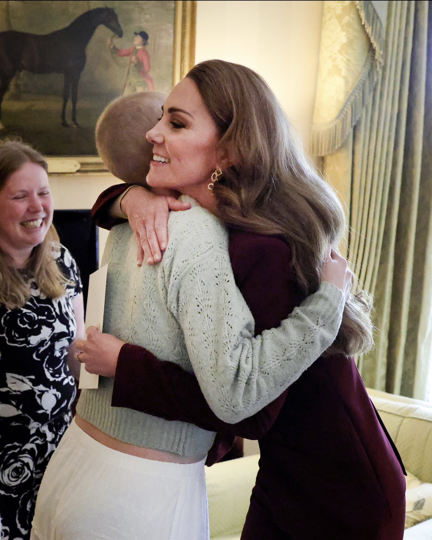 Kate Middleton hugs Liz Hatton.