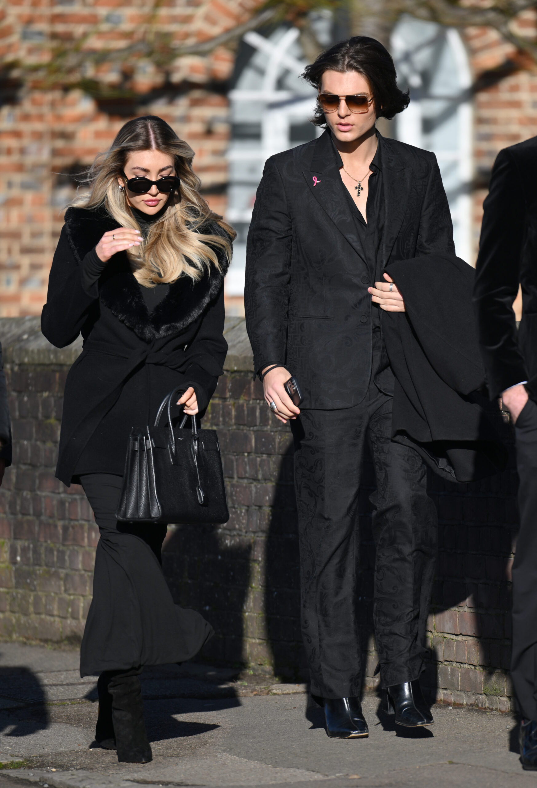 Kate Cassidy and Damian Hurley walking into Liam Payne's funeral