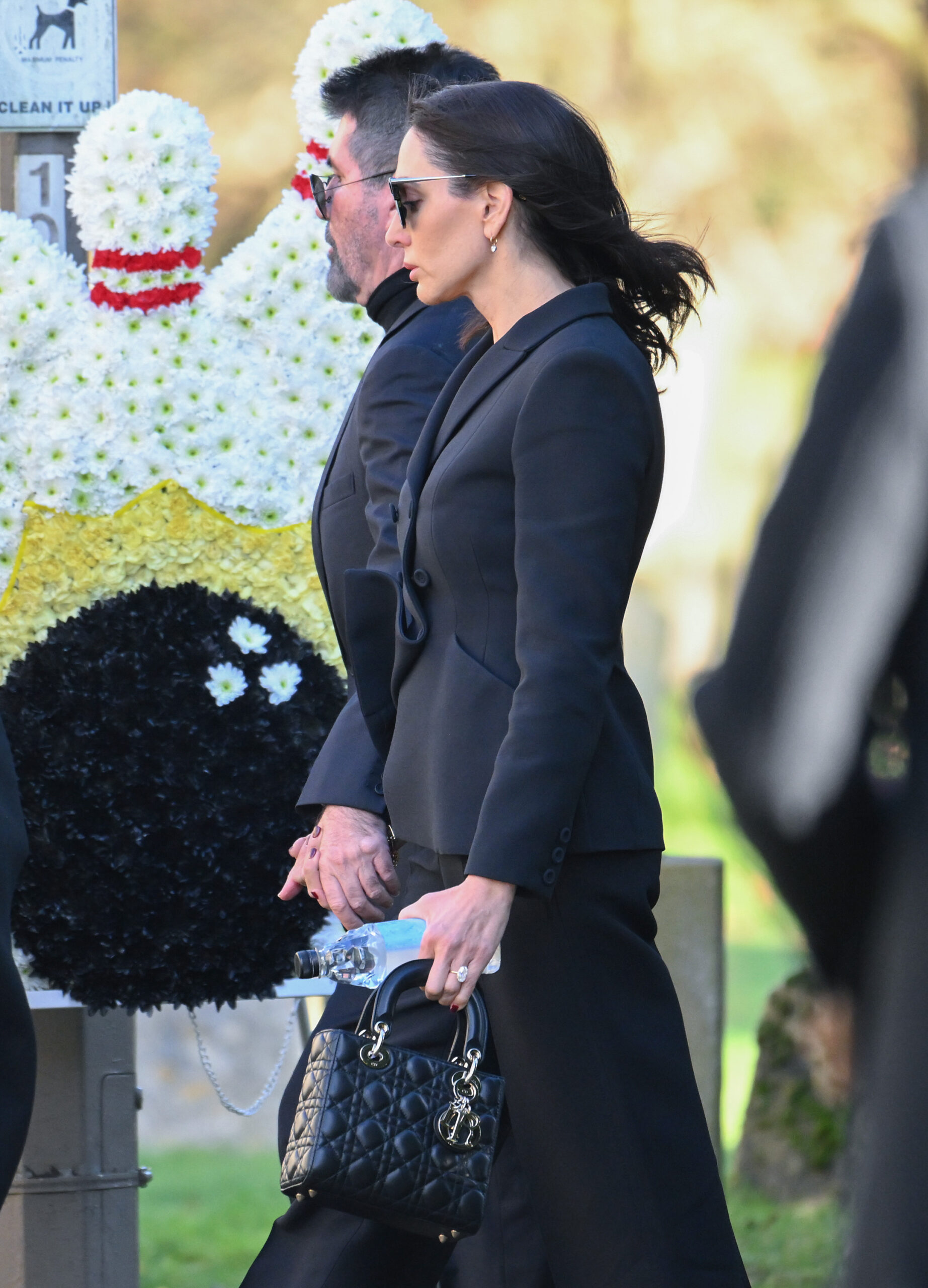 Simon Cowell and Lauren Silverman arriving to Liam Payne's funeral