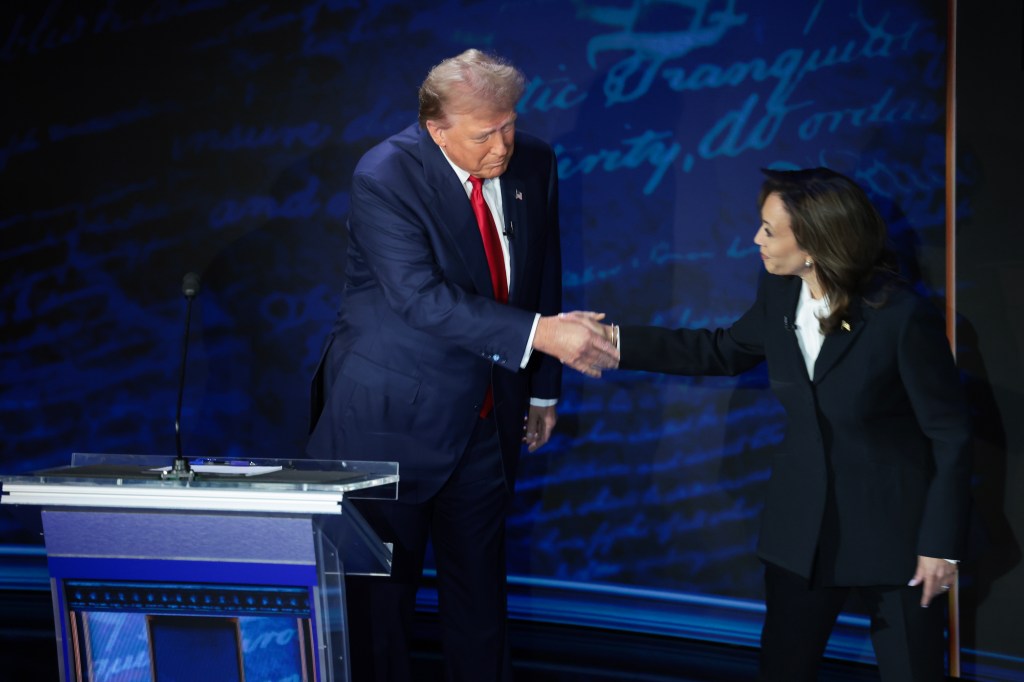 Trump and Harris shake hands