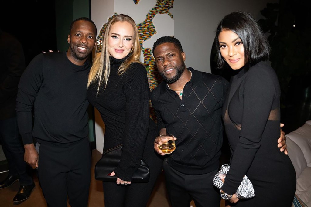 Adele posing with Kevin Hart, Rich Paul and Eniko Hart in a photo posted to Instagram in August 2023.