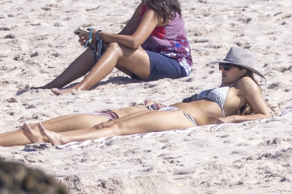 Jessica Alba and her daughter lounging on the beach in Mexico.