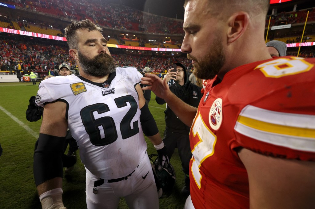 Jason Kelce #62 of the Philadelphia Eagles talks to brother Travis Kelce #87 of the Kansas City Chiefs after their game at GEHA Field at Arrowhead Stadium on November 20, 2023 in Kansas City, MO.