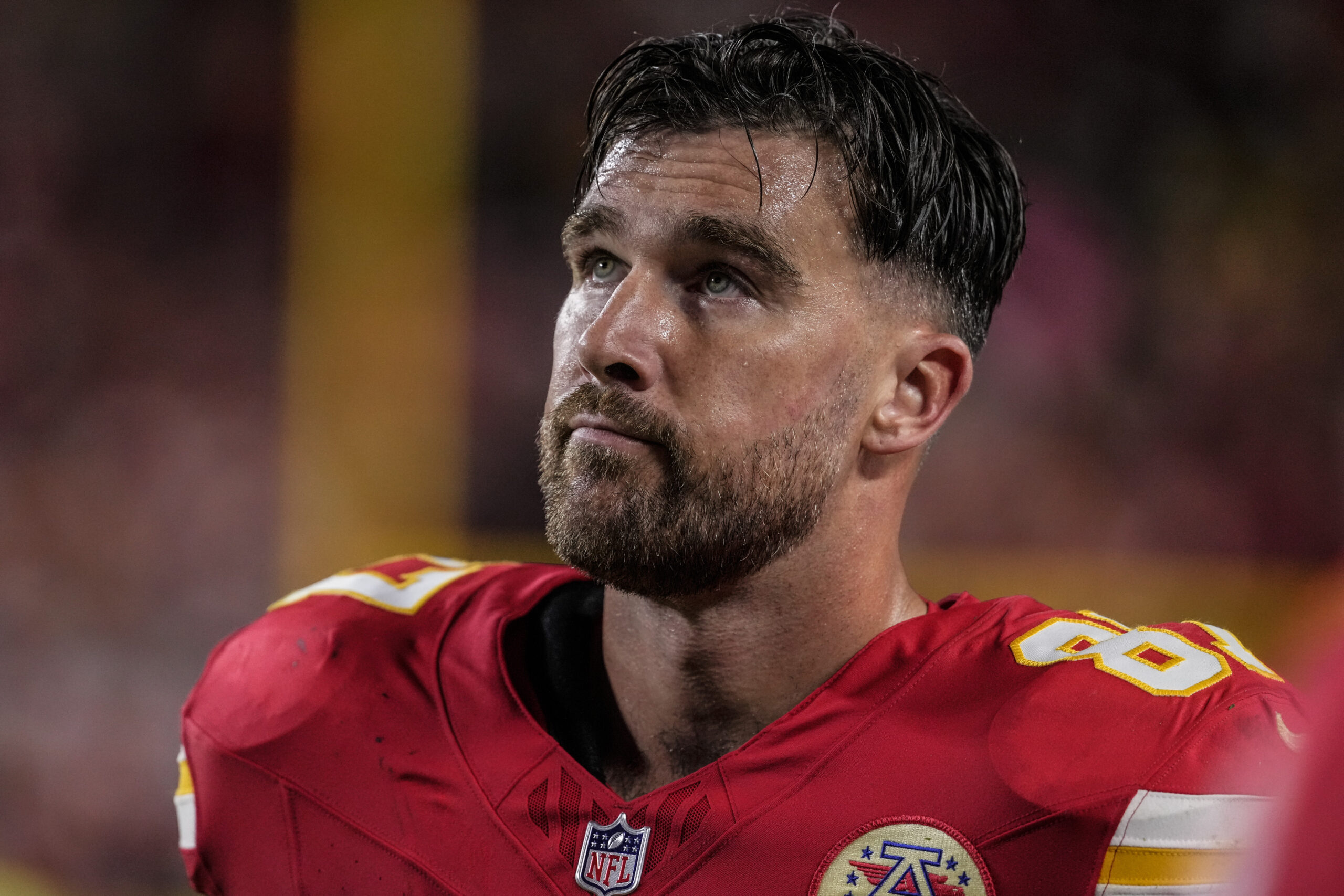 Travis Kelce playing football