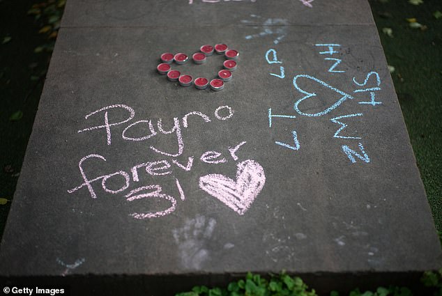 One heartwarming message said 'Payno forever 31', while others laid out candles in the shape of a heart