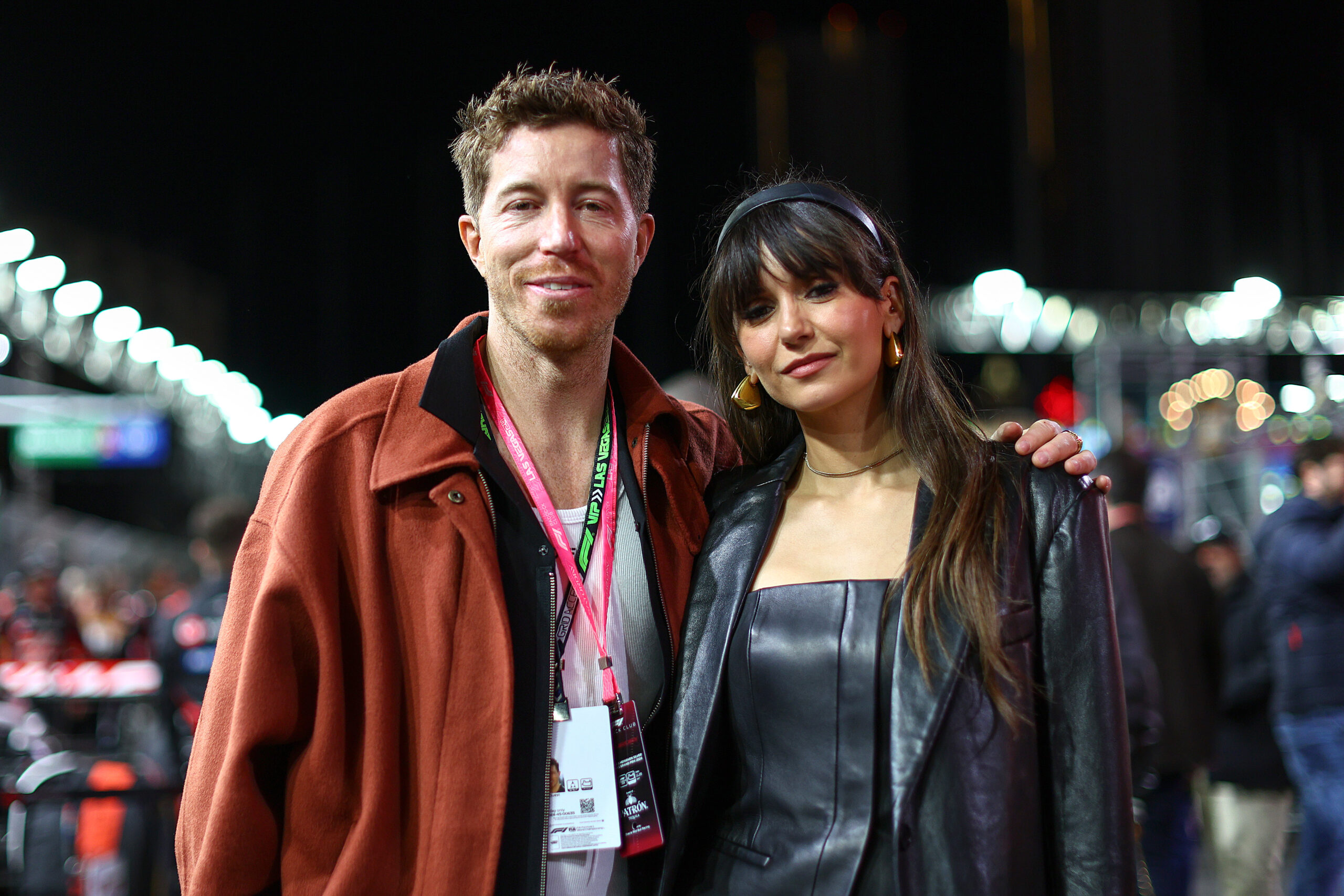 Shaun White and Nina Dobrev walk on the grid prior to the F1 Grand Prix of Las Vegas at Las Vegas Strip Circuit on November 23, 2024 in Las Vegas, Nevada