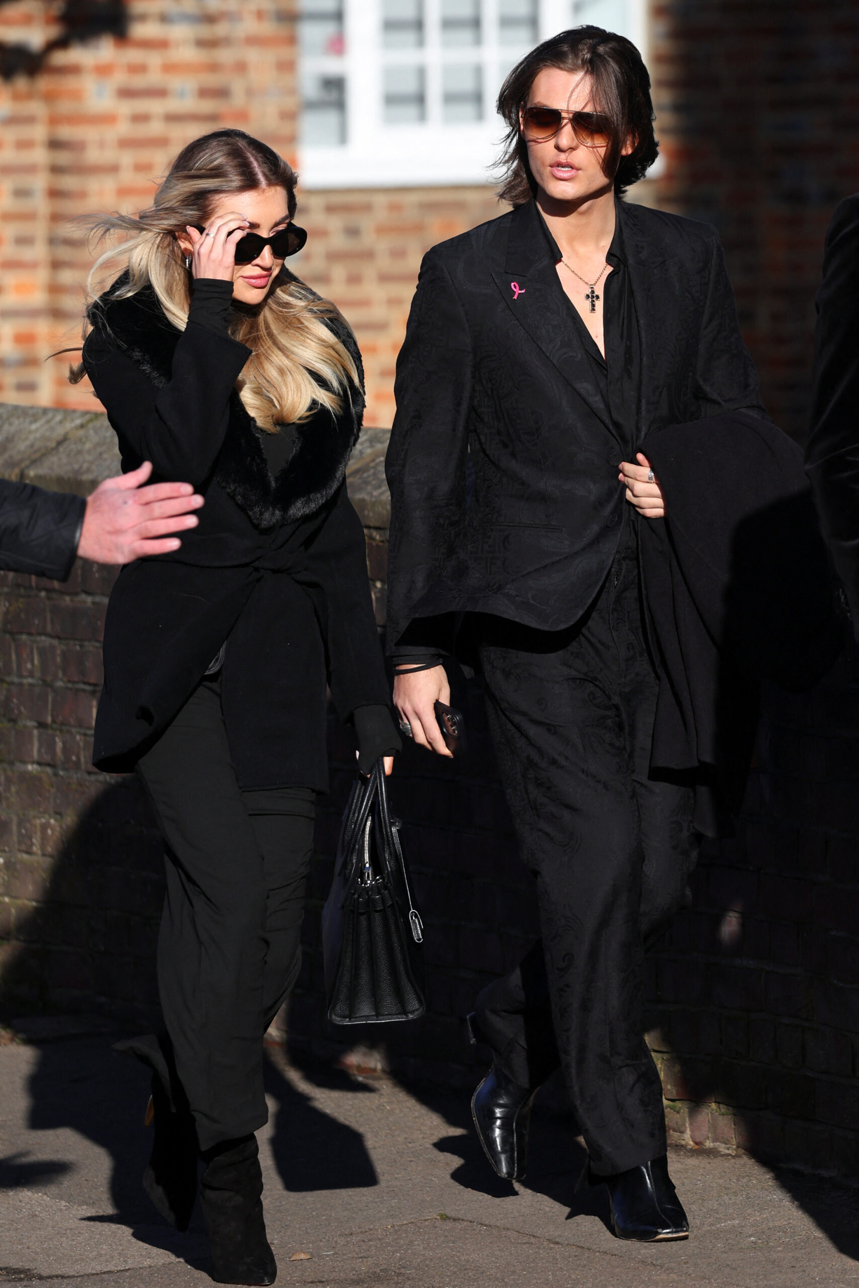 Kate Cassidy and Damian Hurley walking into Liam Payne's funeral