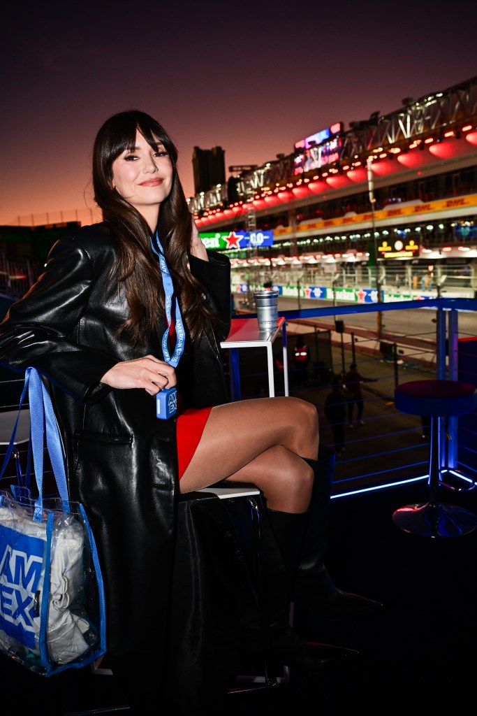 Nina Dobrev watches the exciting F1 action from the American Express Trackside Lounge at Las Vegas Strip Circuit