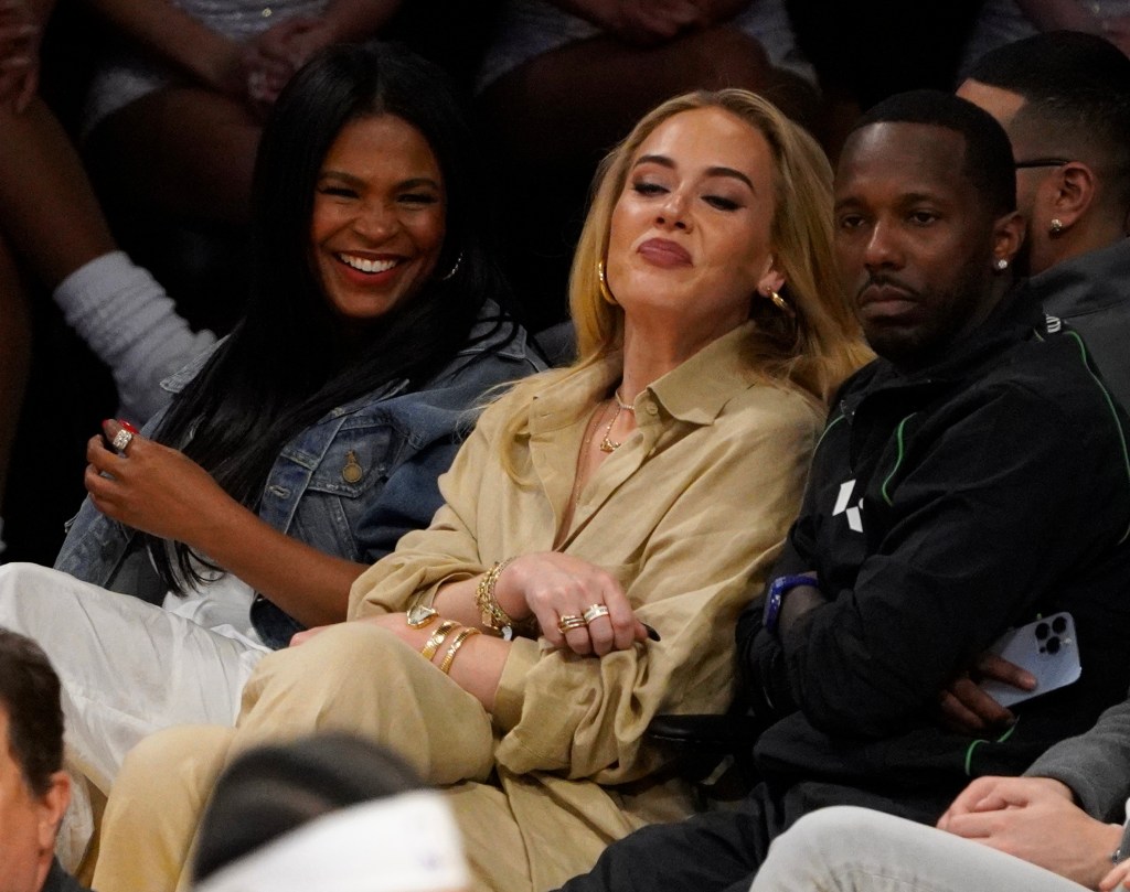 Adele, Rich Paul and Nia Long at Game 3 of the NBA Playoffs between the Los Angeles Lakers and The Golden State Warriors at Crypto.com Arena in Los Angeles in 2023.