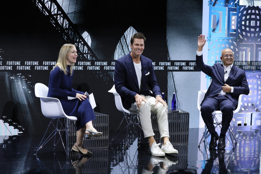 Tom Brady speaking at the Fortune Global Forum 2024