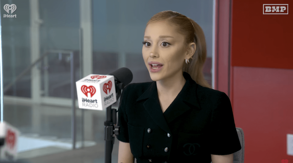 "Las Culturistas" podcast still with Ariana Grande