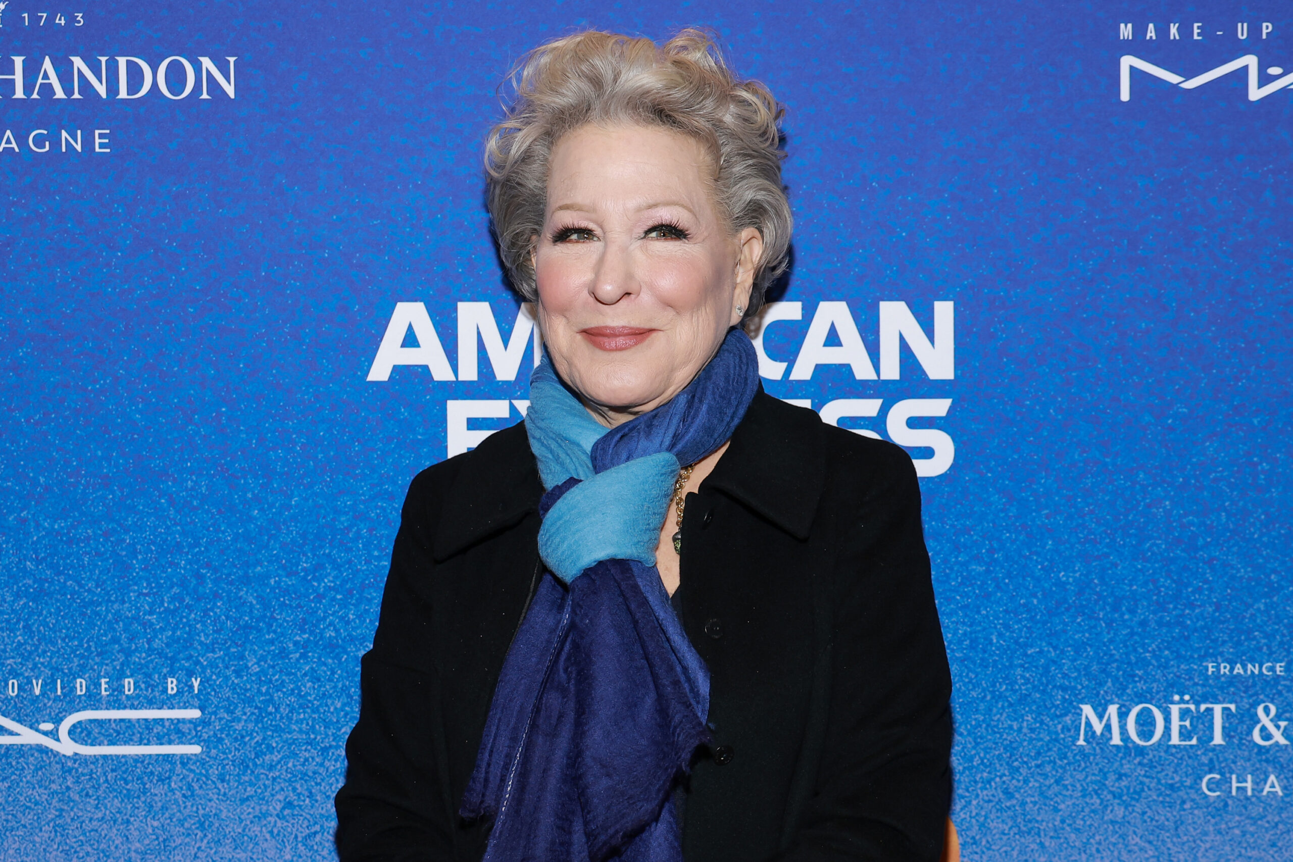 Bette Midler posing for a photo