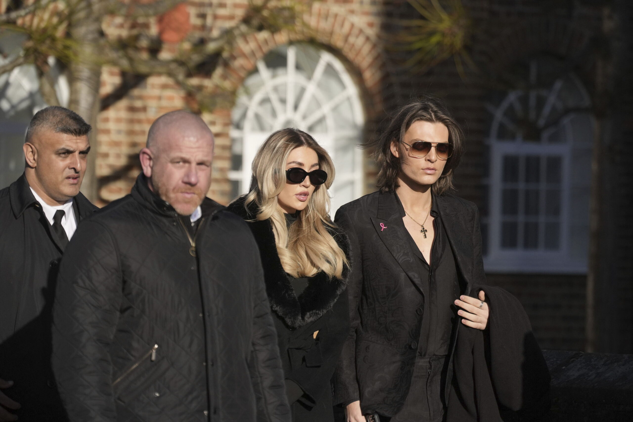 Kate Cassidy and Damian Hurley walking into Liam Payne's funeral