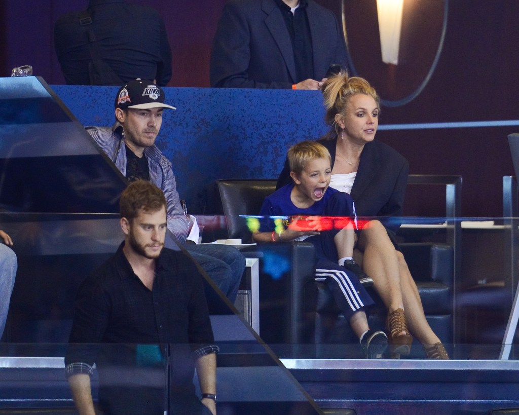 David Lucado, Jayden James Federline and Britney Spears attend a hockey game between the New York Rangers and the Los Angeles Kings in Game Two of the 2014 NHL Stanley Cup Final at the Staples Center on June 7, 2014 in Los Angeles, Calif.