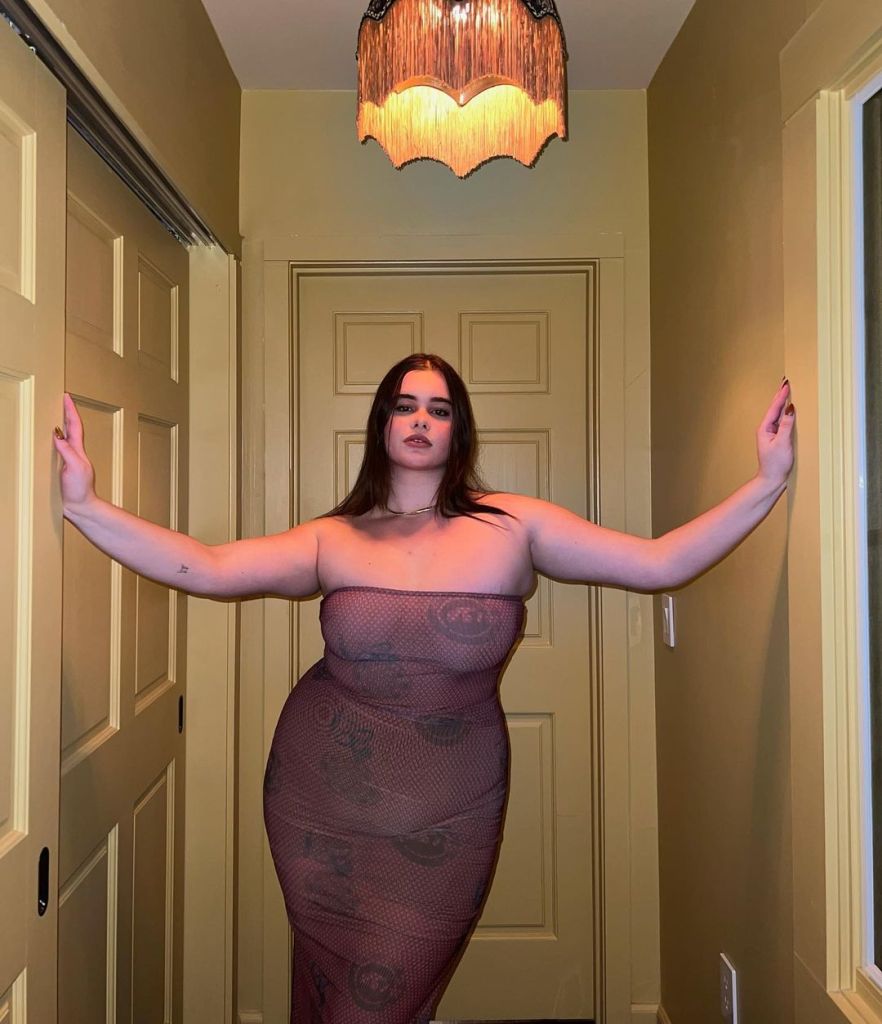 Barbie Ferreira poses in a hallway photo.