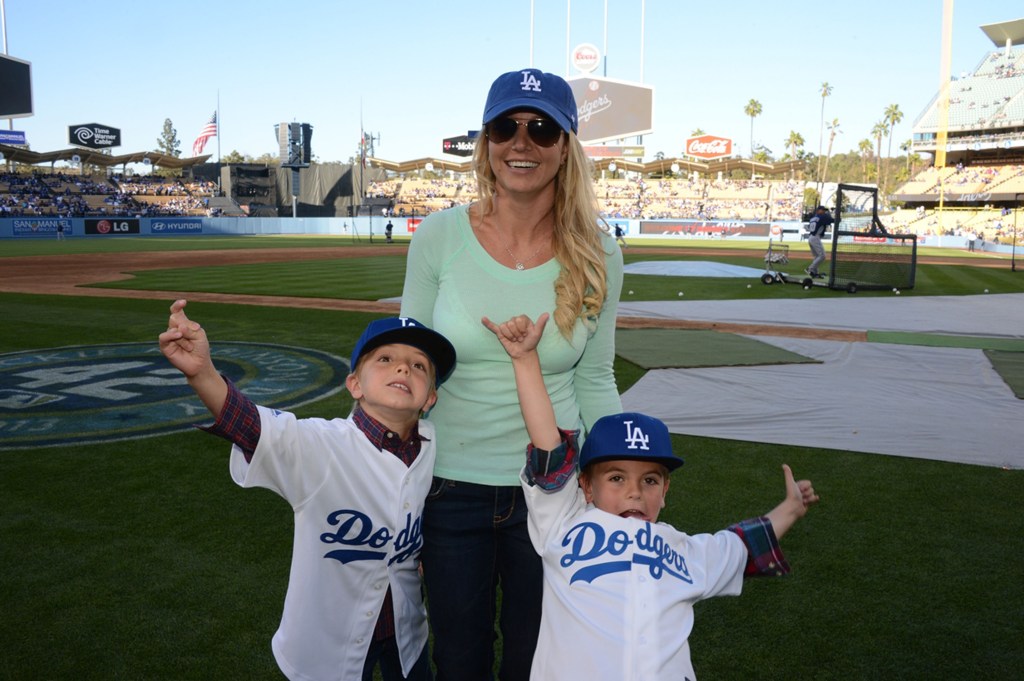 Britney Spears poses with sons Jayden James Federline (L) and Sean Preston Federline (R) during agame against the San Diego Padres at Dodger Stadium on April 17, 2013 in Los Angeles, Calif.