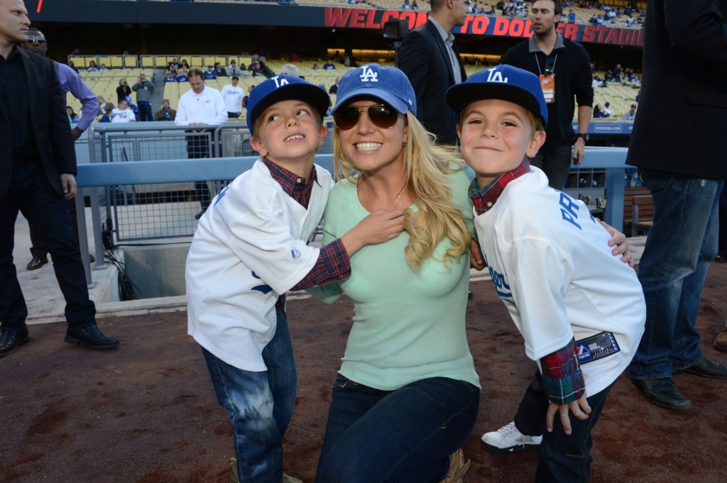 Britney Spears poses with sons Jayden James Federline (L) and Sean Preston Federline (R) during a game against the San Diego Padres at Dodger Stadium on April 17, 2013 in Los Angeles, Calif.