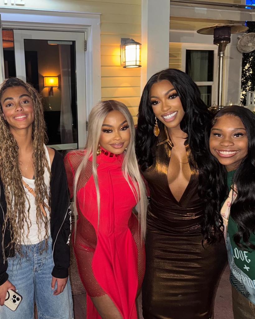 RHOA stars posing in Miami