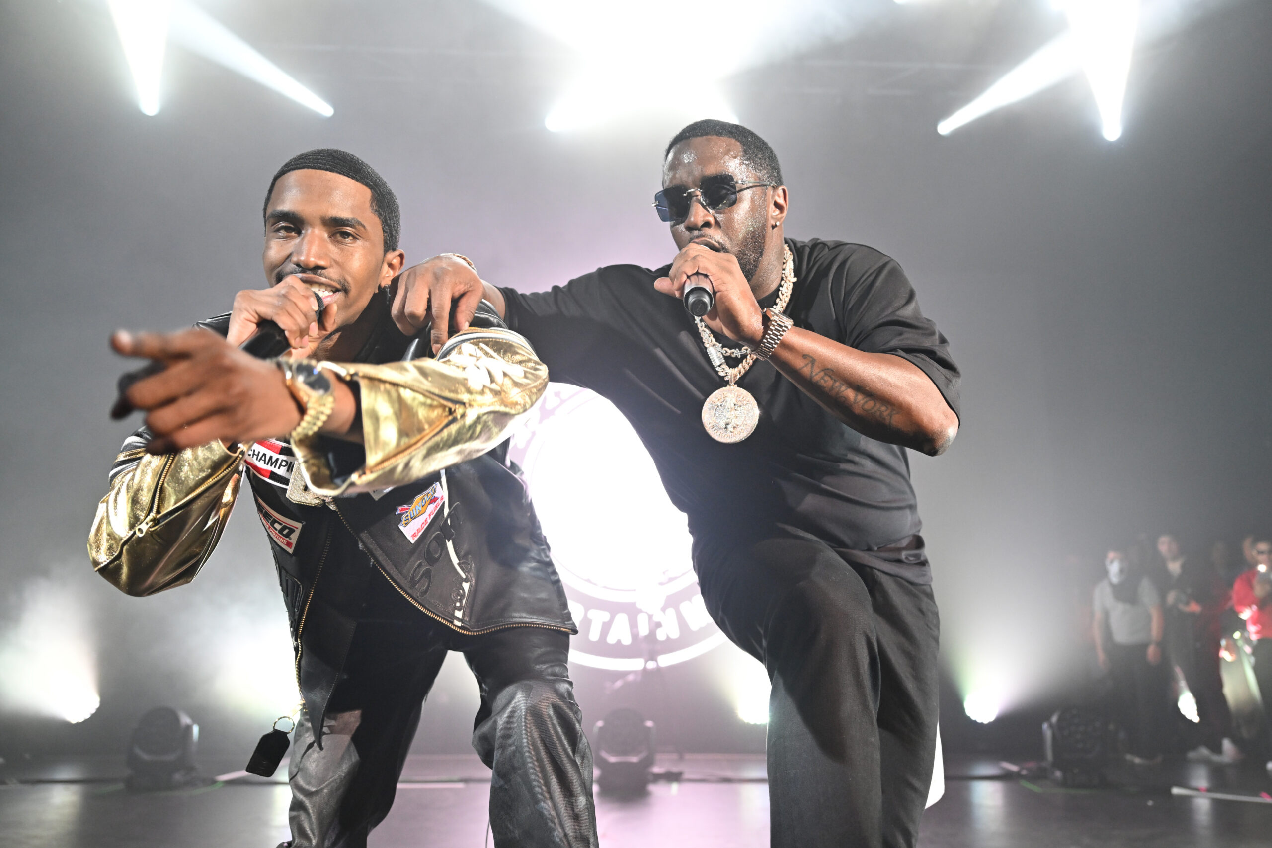 Sean "Diddy" Combs with his son onstage.