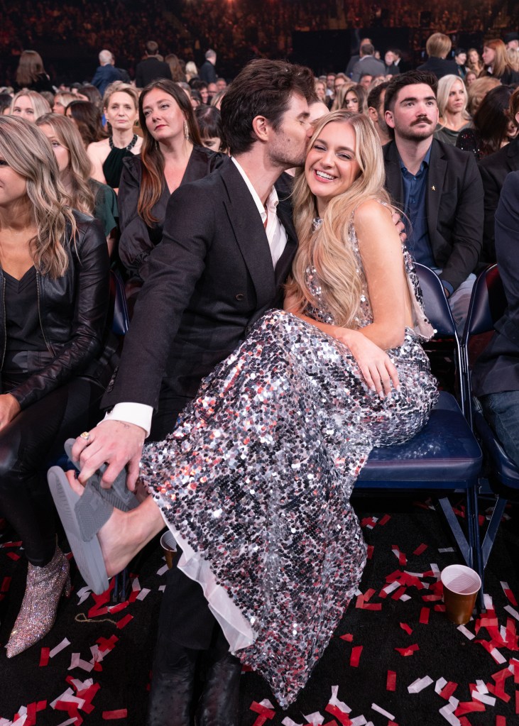 Chase Stokes and Kelsea Ballerini have a sweet moment while attending The 58th Annual CMA Awards in Nashville, Tennessee.