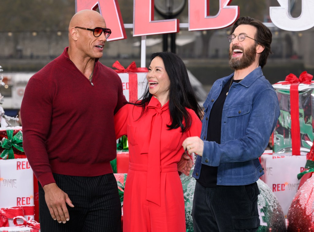 Dwayne Johnson, Lucy Liu and Chris Evans attend the photocall for "Red One" at Potters Fields Park on November 06, 2024 in London.