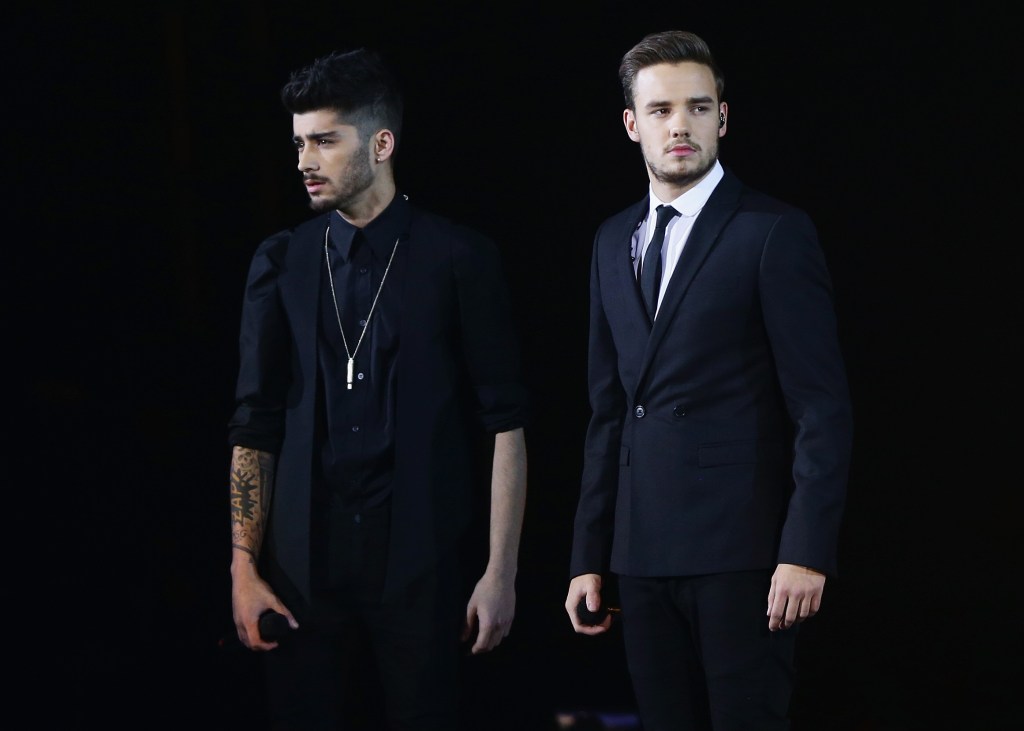 Zayn Malik and Liam Payne perform live.