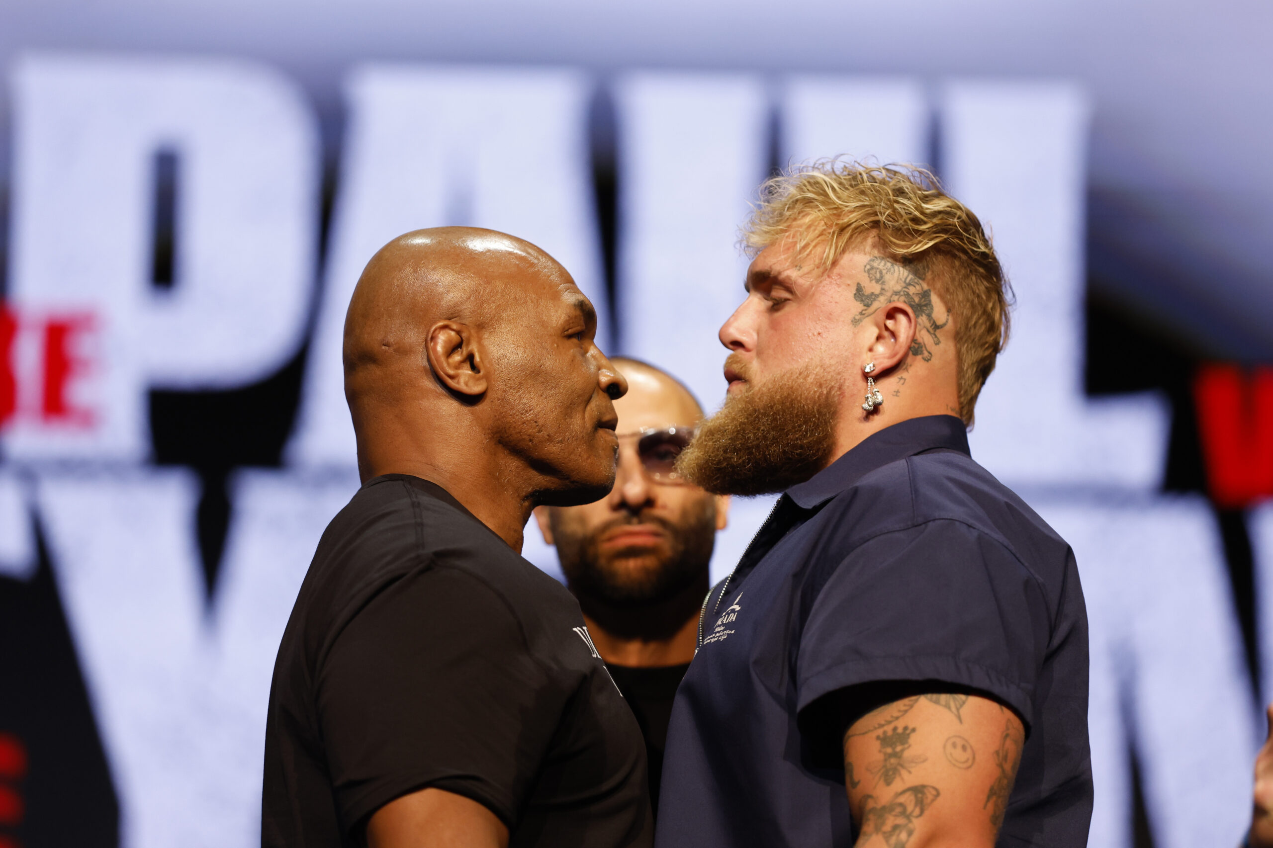 Mike Tyson and Jake Paul at the press conference for their fight in May 2024.