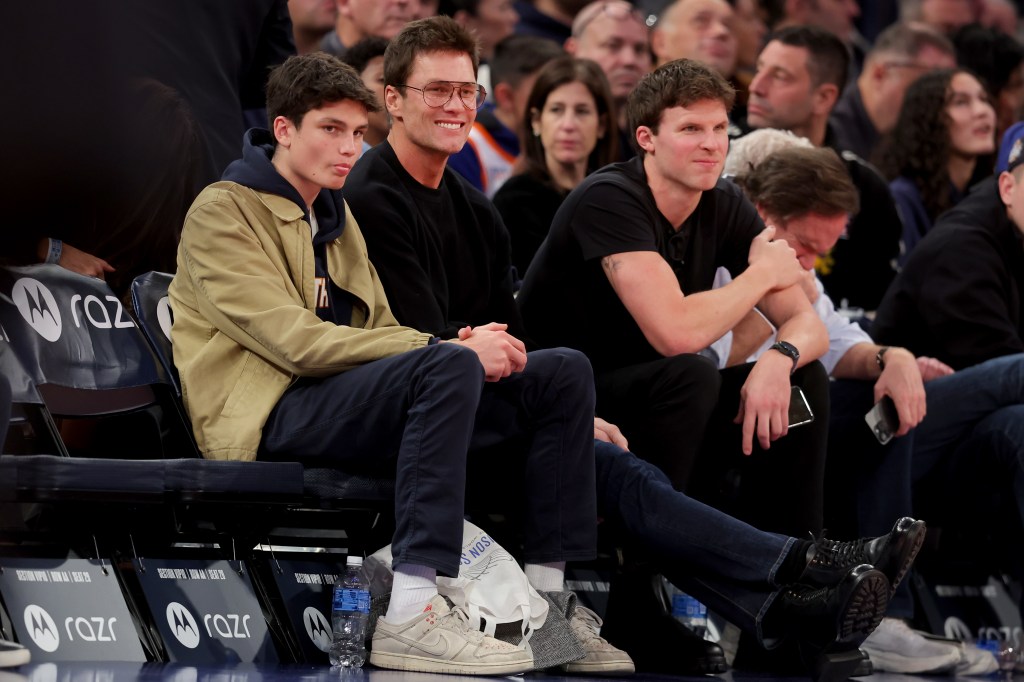 Tom Brady sits court side during the third quarter between the New York Knicks and the Brooklyn Nets at Madison Square Garden on Friday.