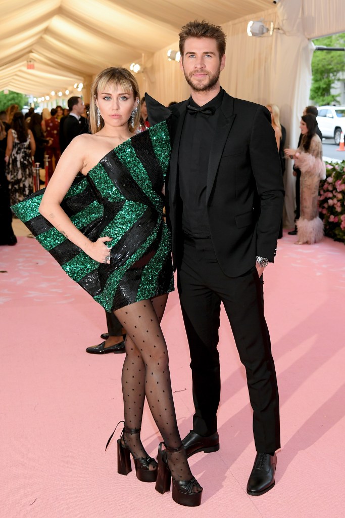 Miley Cyrus and Liam Hemsworth attend The 2019 Met Gala Celebrating Camp: Notes on Fashion at Metropolitan Museum of Art on May 06, 2019 in New York City.