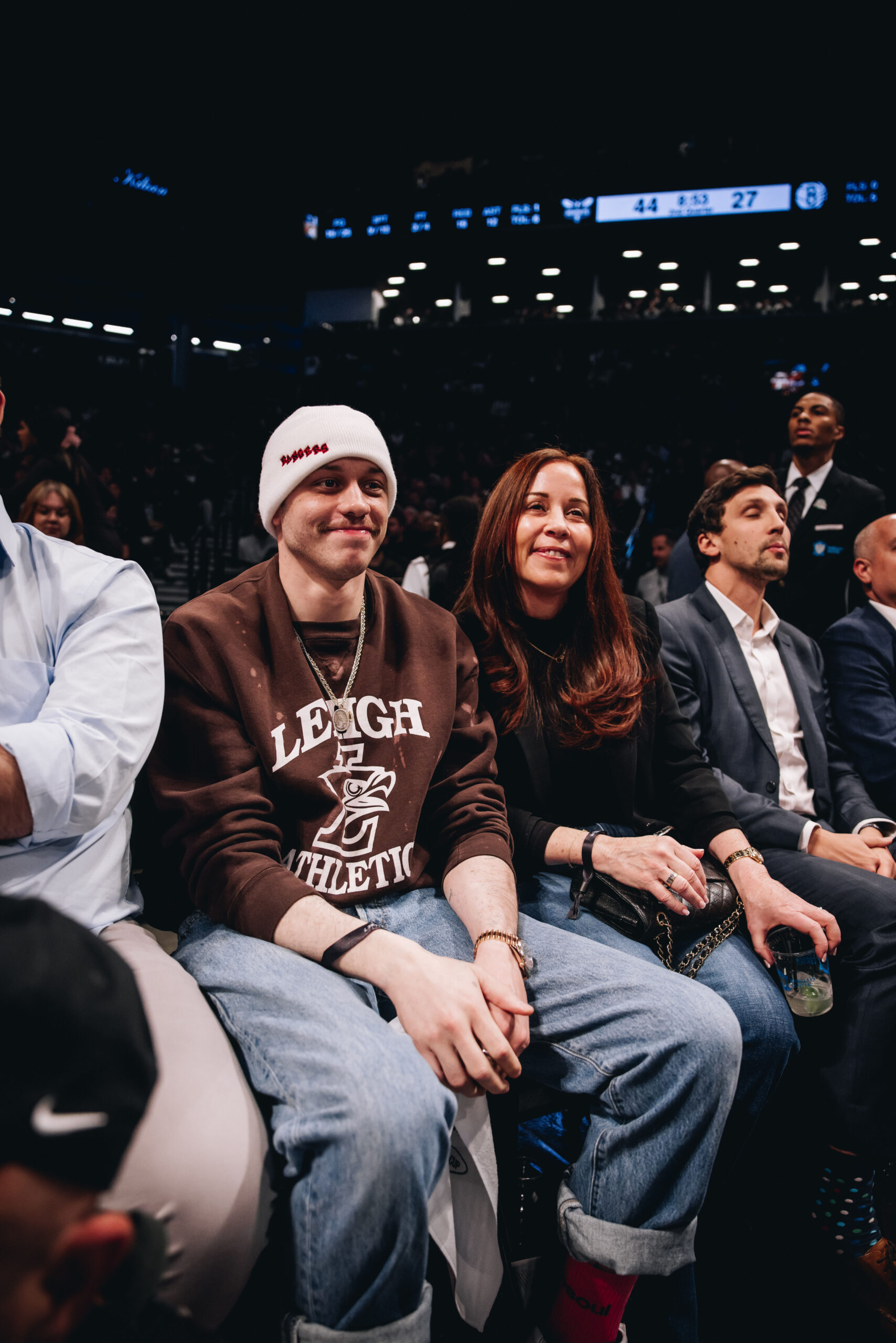 Pete Davidson and his mom Amy courtside.