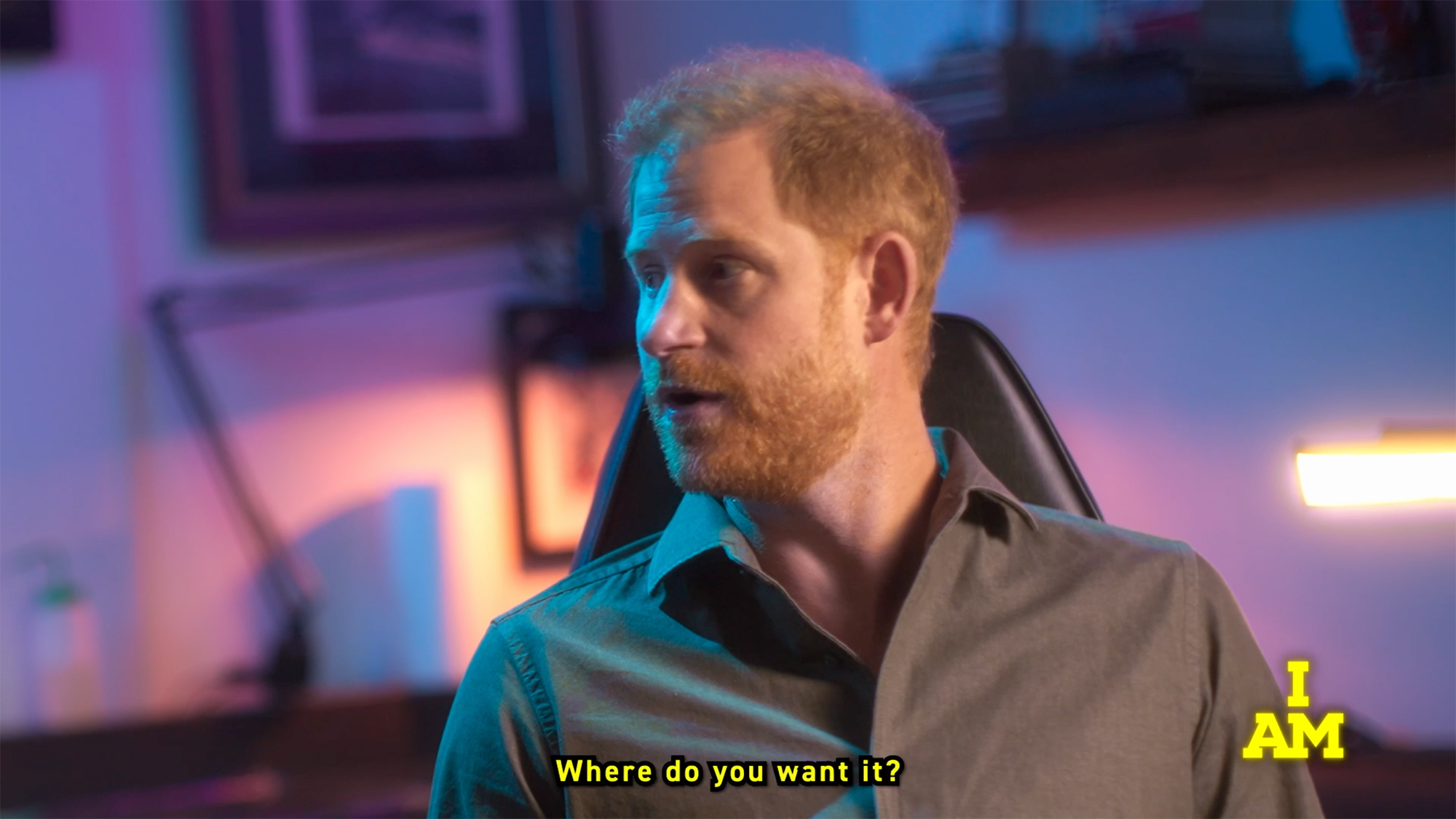 Prince Harry in a tattoo shop.