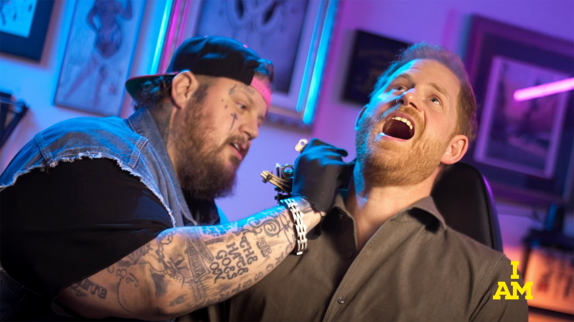 Jelly Roll giving Prince Harry a tattoo.