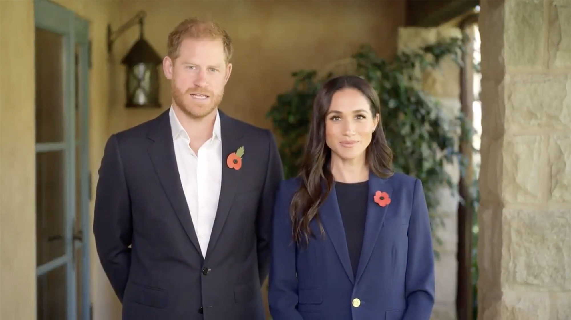 Prince Harry and Meghan Markle standing