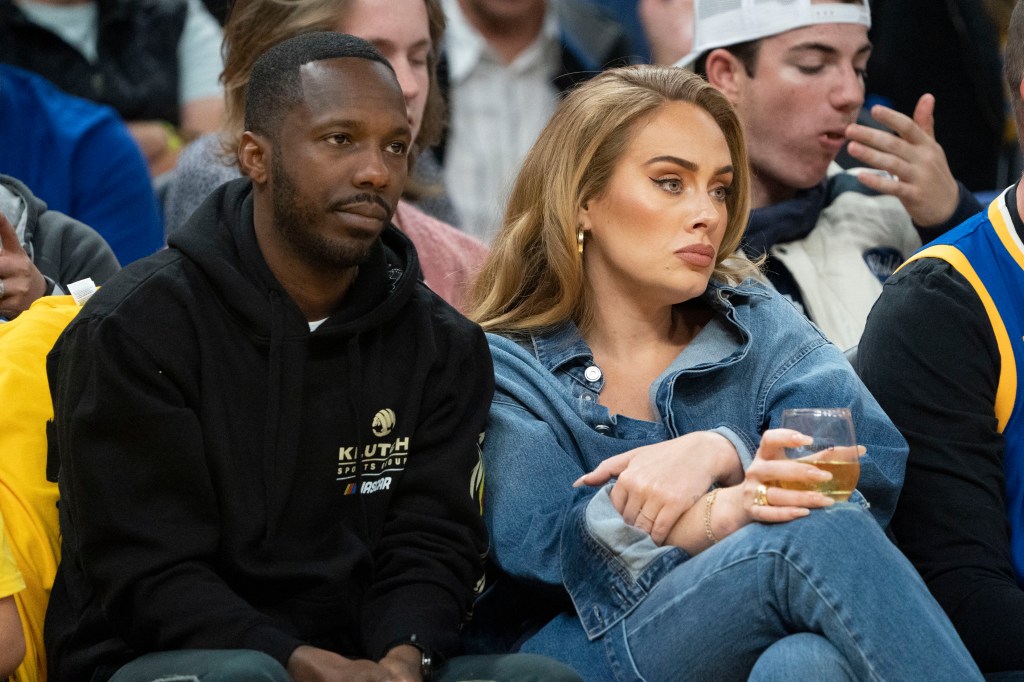 Rich Paul and Adele watch the 2022 western conference finals between the Golden State Warriors and the Dallas Mavericks at Chase Center in May 2022.