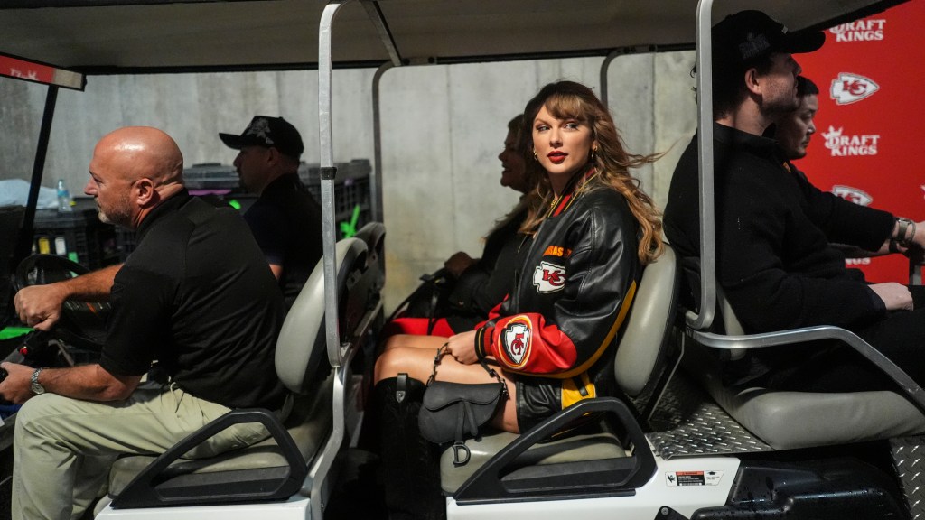 Singer Taylor Swift enters the stadium before an NFL football game between the Kansas City Chiefs and the Tampa Bay Buccaneers on Nov. 4, 2024, in Kansas City, Mo.