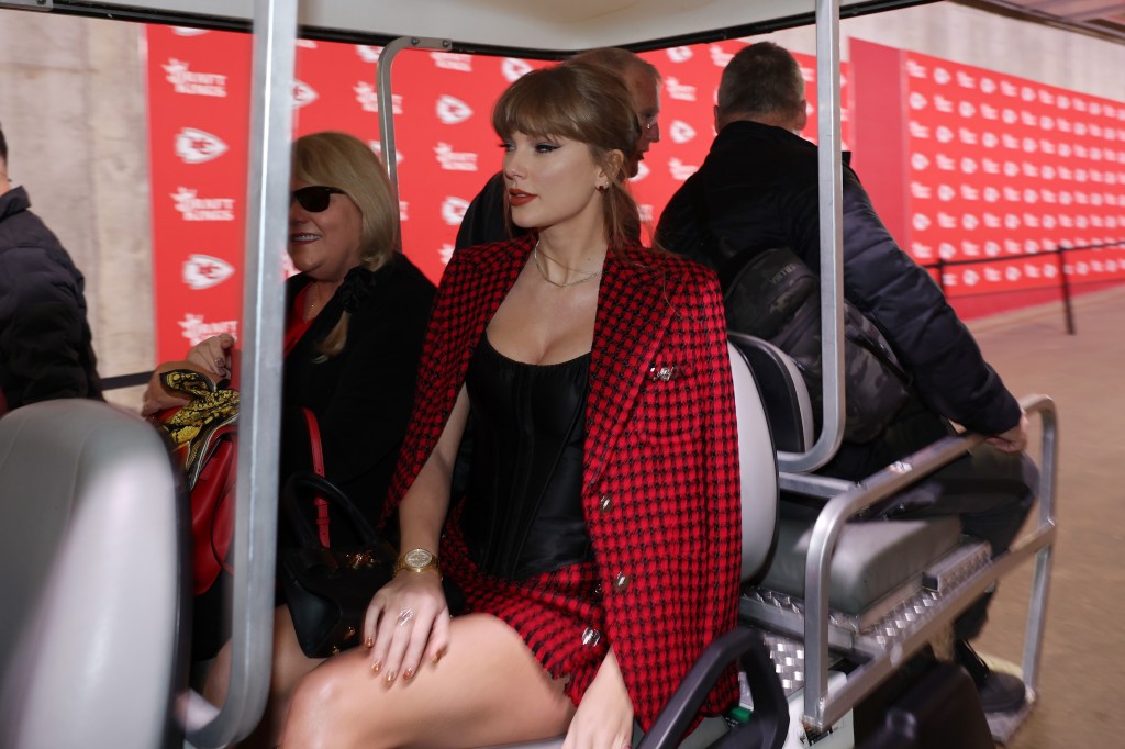 Taylor Swift rides on a golf cart prior to a game between the Kansas City Chiefs and the Denver Broncos at GEHA Field at Arrowhead Stadium on November 10, 2024 in Kansas City, Missouri.