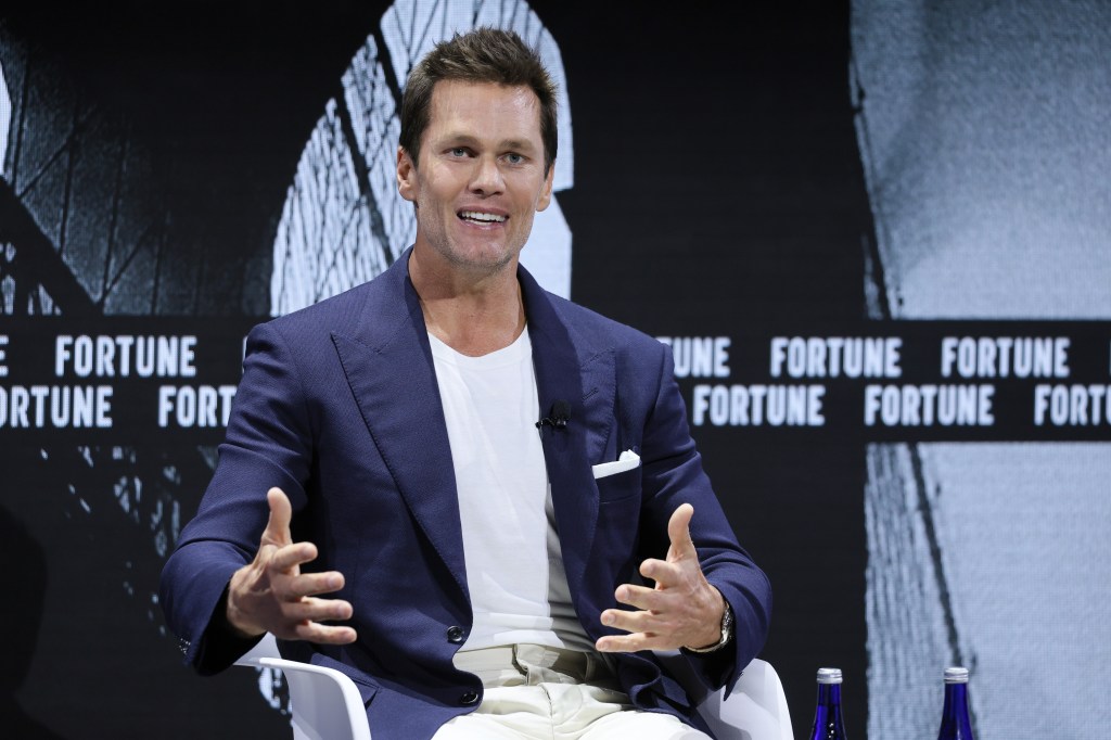 Tom Brady speaking at the Fortune Global Forum 2024