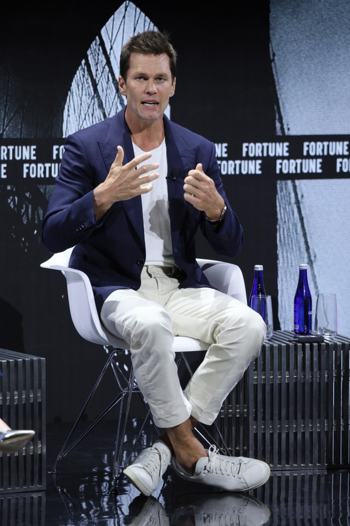 Tom Brady speaking at the Fortune Global Forum 2024