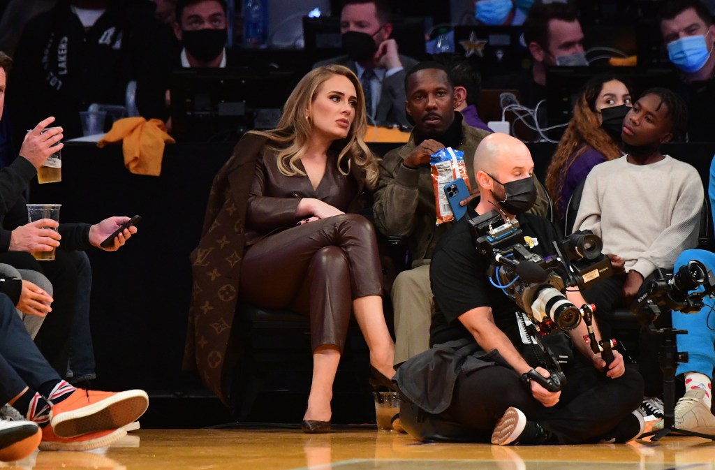 Adele attends a game between the Golden State Warriors and the Los Angeles Lakers on October 19, 2021 at STAPLES Center in Los Angeles.