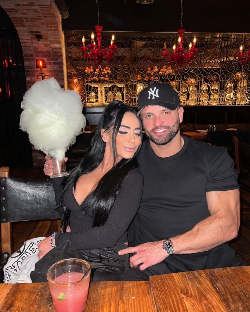 Angelina Pivarnick and Vinny Tortorella at a restaurant