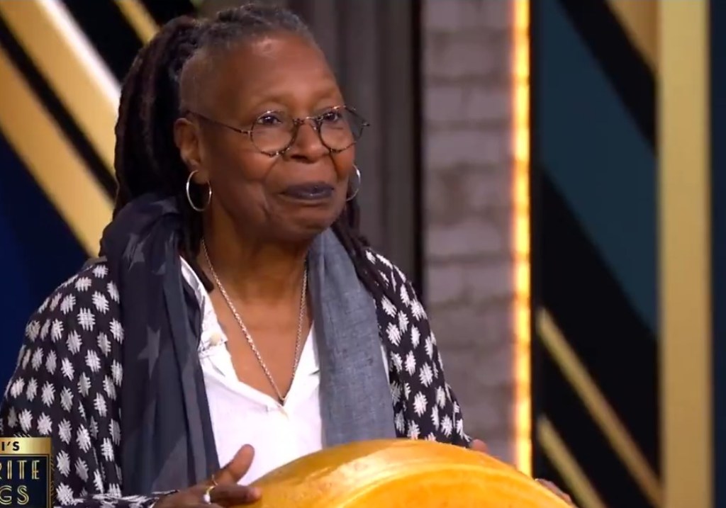 Whoopi Goldberg and wheel of cheese