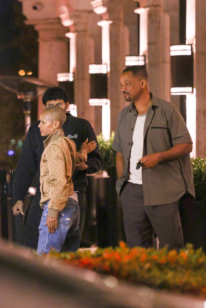 Will Smith and Jada Pinkett Smith leave dinner in Los Angeles with a friend.