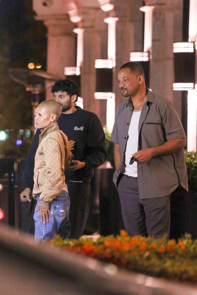 Will Smith and Jada Pinkett Smith leave dinner in Los Angeles with a friend.