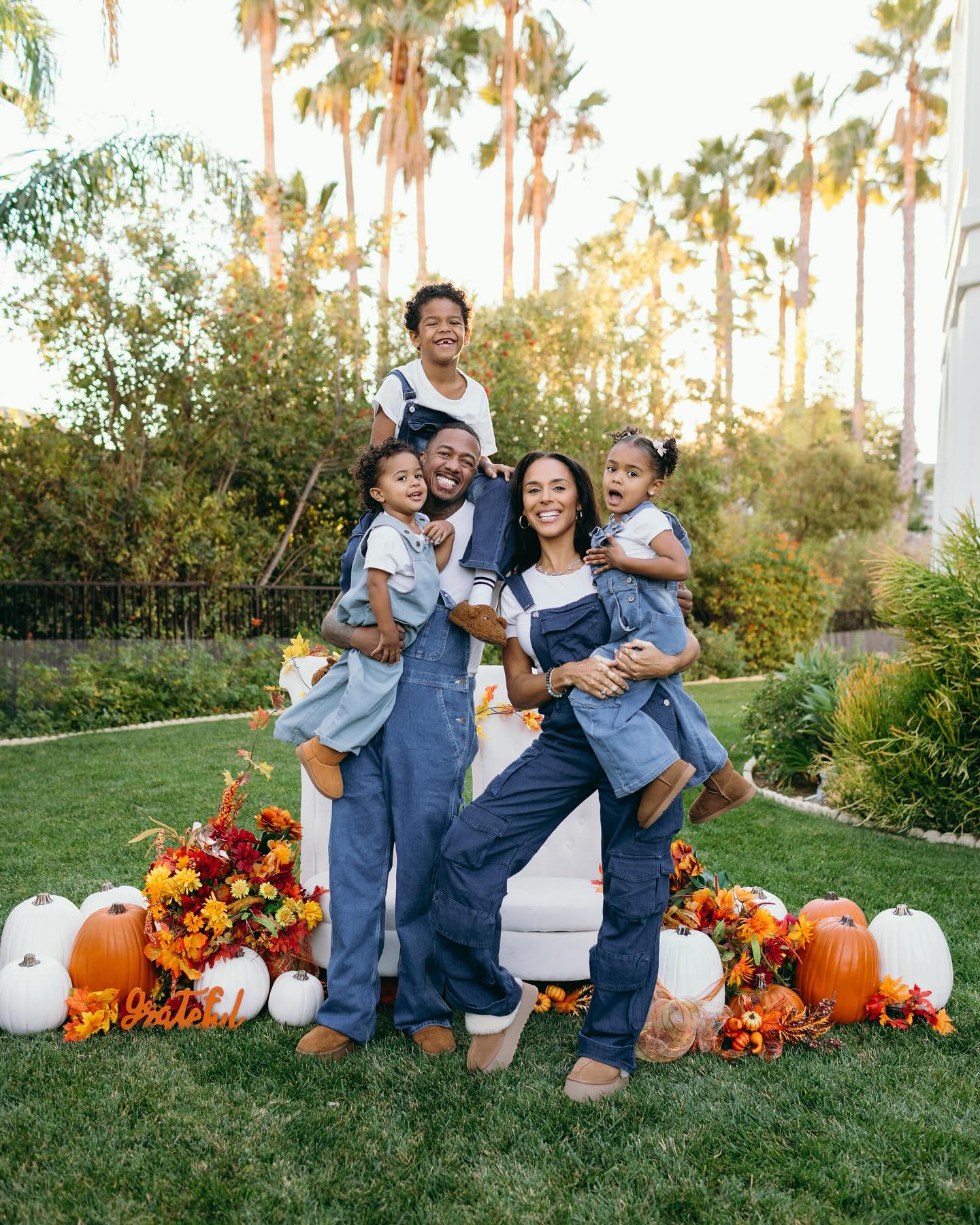 Nick Cannon poses for a Thanksgiving photo with his children.