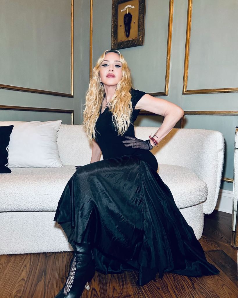 Madonna in a black dress