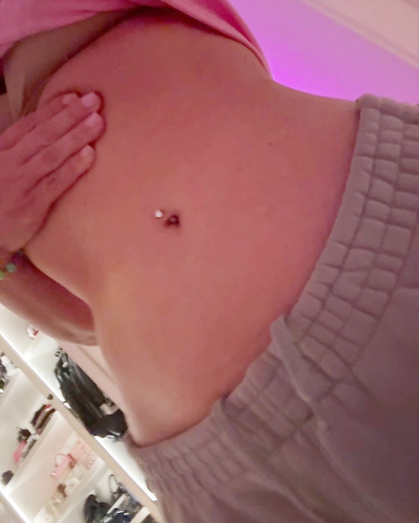 Kim Kardashian belly button ring