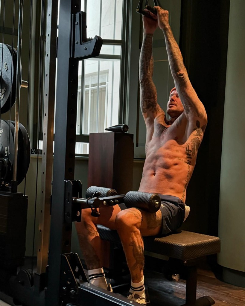 David Beckham lifting weights in a gym during a morning workout