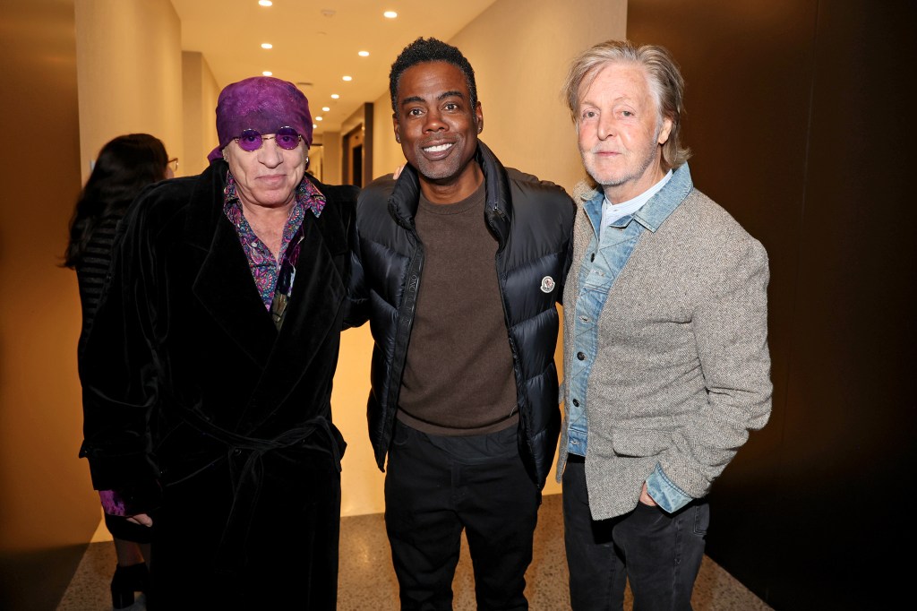 Steven Van Zandt, Chris Rock, and Sir Paul McCartney posing for a photo at the Beatles '64 Premiere at Hudson Square Theater in New York City, November 24, 2024